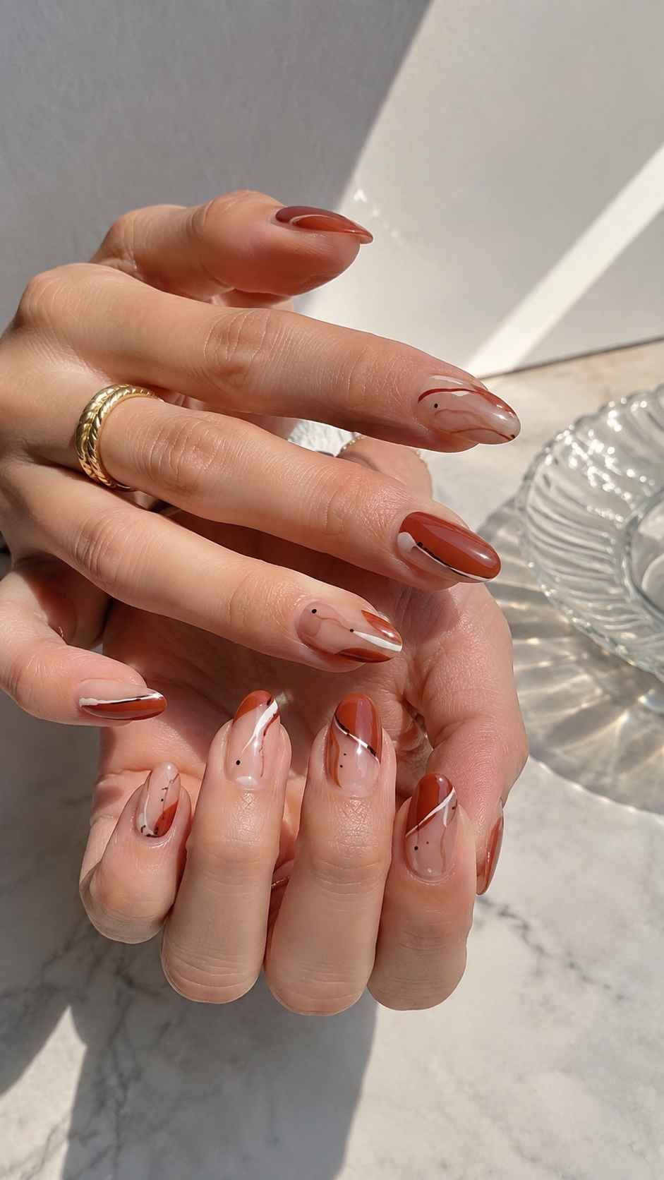 Brick Red Graphic Nails With Quiet Artistic Detail