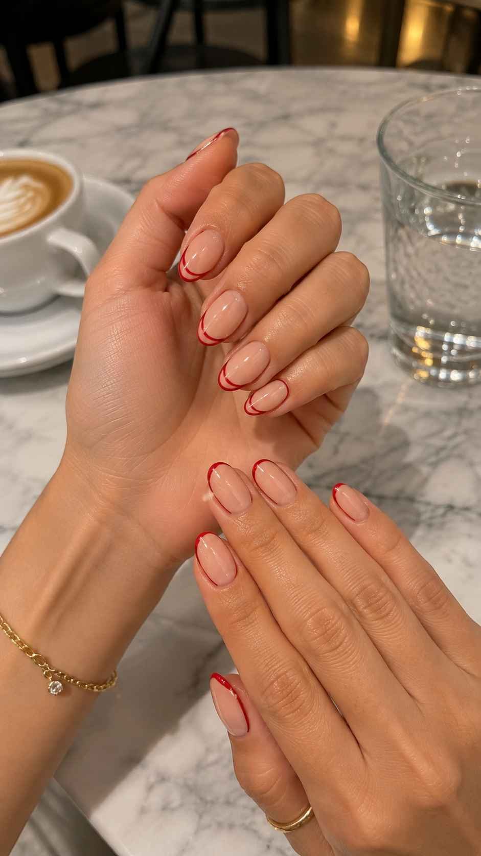 Glossy Red Edges Around Nude Nails